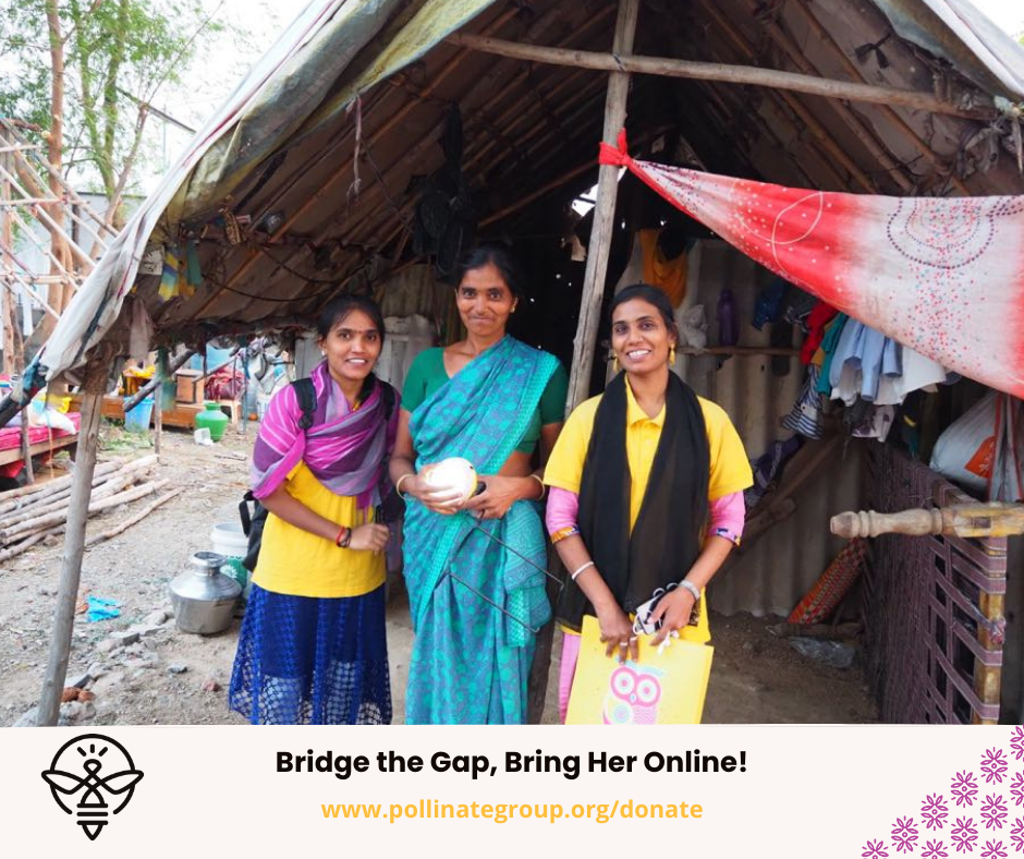 A woman entrepreneur and her customers holding solar lanterns in urban Indian slum.